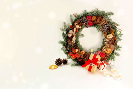 Christmas table decoration banner. Green fir branches candle gift boxes blue balls lights isolated white background. Minimalist home new year decor old style. Xmas concept copy space mock up bannerの写真素材