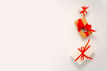 2021 Happy New Year, Merry Christmas decorations flatlay long banner. Gift boxes in row red ribbon...