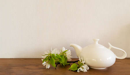 White living room minimalist interior shelf mockup. Decoration living room home interior. Cozy interior shelf apple flowers vaze tea pot. Room modern white empty wall. Copy space backdrop designの写真素材