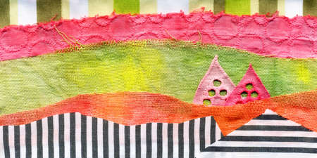Fabric art applique Illustration. Patchwork forest landscape with trees, hills and sky. Original graphic illustration with jeans striped fabric flaps. Decorative landscape hand made recycled trash artの写真素材