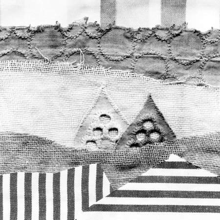 Fabric art applique Illustration. Patchwork forest landscape with trees, hills and sky. Original graphic illustration black and white. Decorative landscape hand made recycled trash artの写真素材