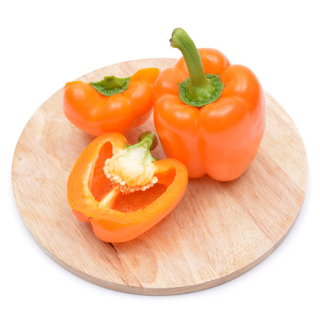 Sweet pepper on cutting boardの写真素材