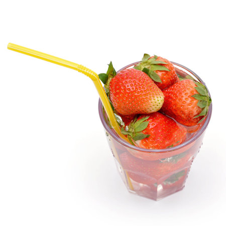 Drink of strawberries in a glass isolated on whiteの写真素材
