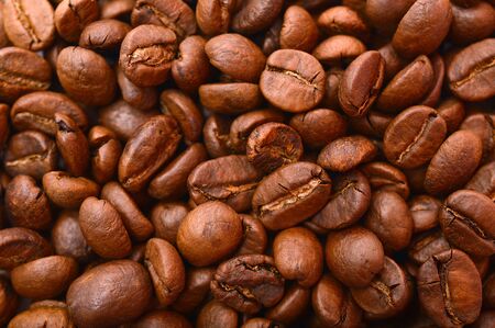 Roasted coffee beans texture close up background.の写真素材