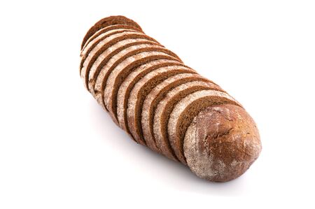 Sliced wholegrain bread on isolated white background closeup.の写真素材