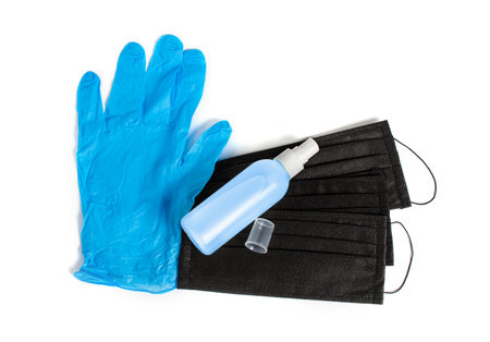 Medical white background. Medical mask, sanitizer gel and lab gloves. Virus protection equipment. Asian ncov coronavirus. Novel Coronavirus 2019-nCoV. disposable gloves and mask isolated on whiteの写真素材