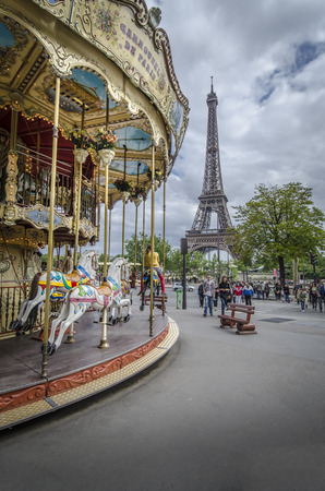 Carousel in Paris with the Eiffel Tower in the backgroundのeditorial素材