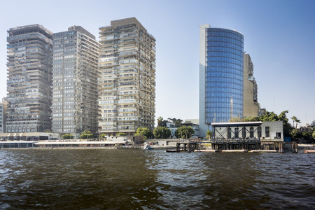 Tower blocks on the banks of the river Nile in the city of Cairo, Egypt, taken from the river Nileのeditorial素材