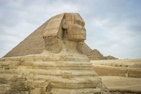 The Sphinx and Pyramid of Khufu in Giza, Cairo, Egypt