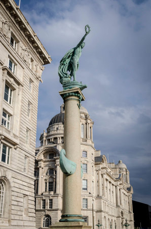 LIVERPOOL UK, MAY 6 2012: The Cunard war memorial, a bronze figure of Victory on a Roman Doric column in granite. Liverpool, UKの写真素材