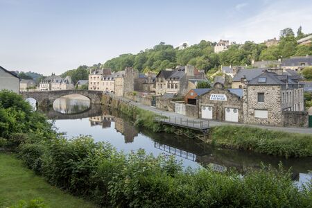 View of the town and bridge crossing the river Rance at Dinan, Brittany, Franceの写真素材