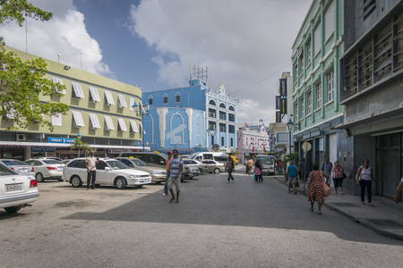 BRIDGETOWN, BARBADOS, 21 DECEMBER 2015 - Colourful buildings and shoppers  in Lower Broad Street, Bridgetown, Barbadosのeditorial素材