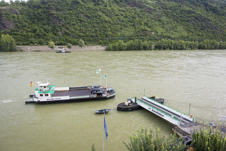 The Stadt Boppard car ferry crossing the river Rhine at Boppard, Germany