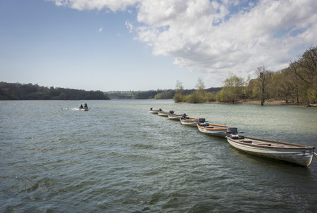 Boats on Bewl Water reservoir in High Weald, Kent, UKの写真素材