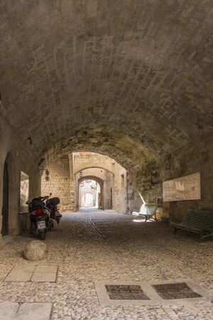 Covered, arched passage in the medieval town of Rhodes, Greeceのeditorial素材