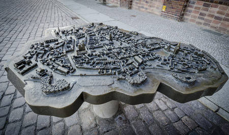 Bronze scale model of the town of Stralsund in Germany with braille descriptionのeditorial素材