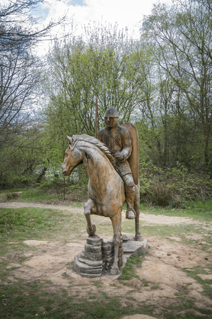 A wooden statue of a soldier astride his horse on the battlefield, Battle Abbey, Sussex, UKのeditorial素材