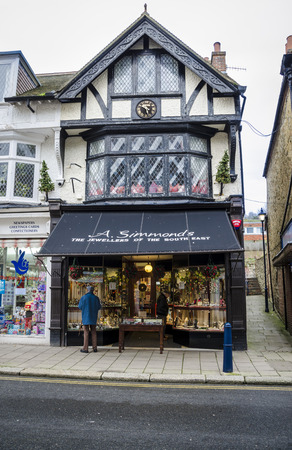 Shoppers browsing the jewellers shop in the High Street, Hythe, Kent, UKのeditorial素材