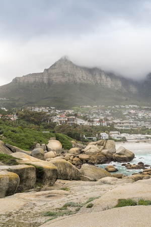 The coastline of Camps Bay, Clifton, Cape Town, South Africa, with the twelve apostle mountains behind it.の写真素材