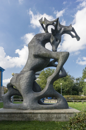 A large Stag sculpture by Edward Bainbridge Copnall (1963) at Lockmeadow in the Kent Millenium River Park, Maidstone, Kent, UKのeditorial素材