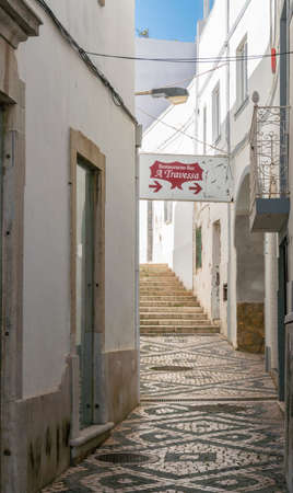 Narrow cobbled alley in Albufeira in the Algarve, Portugalのeditorial素材