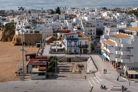 View of the beach and old town  in Albufeira, Algarve, Portugalのeditorial素材