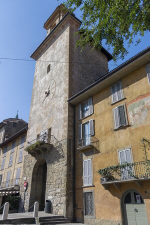 Ancient clock tower in the old city of Bergamo, Italyの写真素材