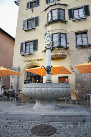 An ornate water fountain in the ancient town of Hall in Tirol, Austriaのeditorial素材