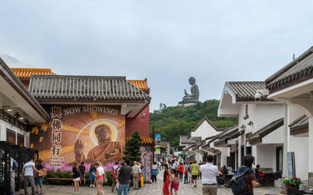 View of the Ngong Ping Village with Tian Tan Big Buddha statue in the distance, on Lantau Island, Hong Kongのeditorial素材