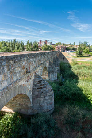 Ancient stone Roman bridge in the city of Salamanca, Spainの写真素材