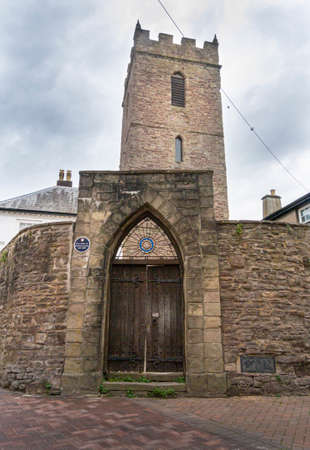 View of St Johnâs Church and King Henry VIII School gate in the town of Abergavenny, Wales, UKのeditorial素材