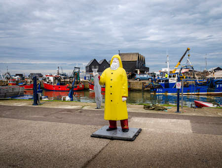 Whitsable, Kent, UK, February 2021 - Fisherman statue in the harbour at Whitstable, Kent, UKのeditorial素材