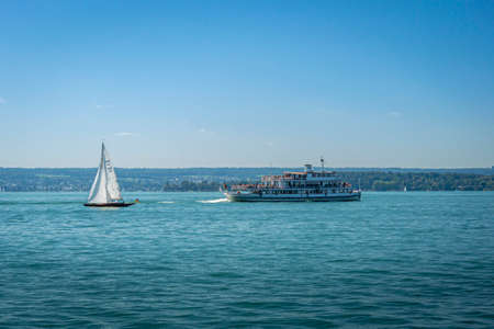 Meersburg, Germany, September 2016 - Ferry and yacht on Lake Constance  in the city of Meersburg,...