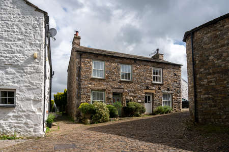 Facade of a stone building in the village of Dent, Cumbria, UKのeditorial素材