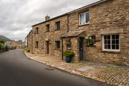 Facade of stone buildings in the village of Dent, Cumbria, UK