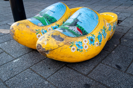 A colorfully painted pair of wooden Dutch Clogsの写真素材