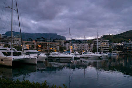 View of Table Mountain with yachts in the foreground at  Victoria and Alfred Waterfront at dusk, Cape Town, South Africaのeditorial素材