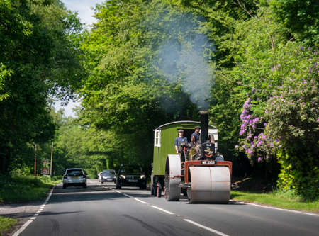 Steam roller driving on the road in Sussex, UKのeditorial素材