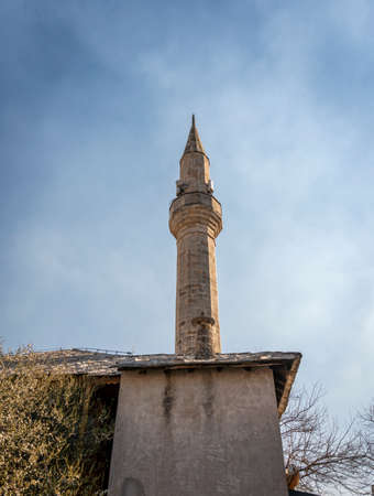Looking up at a minaret tower in the city of Mostar, Bosnia & Herzegovinaのeditorial素材