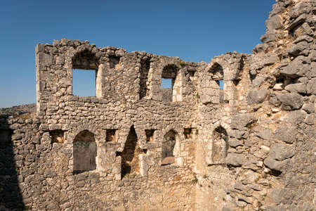 Walls of the stone fortress in Pocitelj medieval village in the Capljina municipality in Bosnia and...