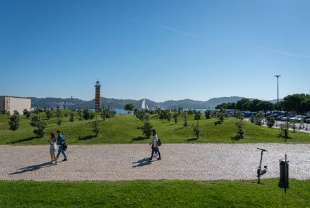 View of the waterfront and Belem lighthouse in the city of Lisbon, Portugalのeditorial素材