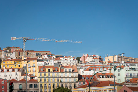 A crane above view of buildings on a hill in Lisbon, Portugalのeditorial素材