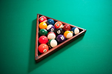 billiard balls on green table の写真素材