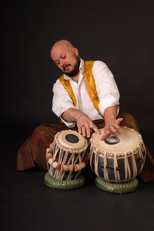 Musician with oriental tabla drums