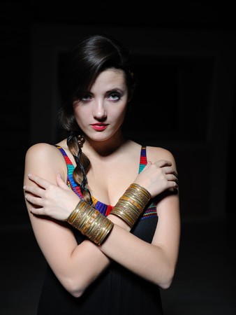 Beautiful model girl with long hair and bright make-up