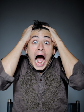 Expressions. Handsome man is terrified and feeling fear . open mouthの写真素材