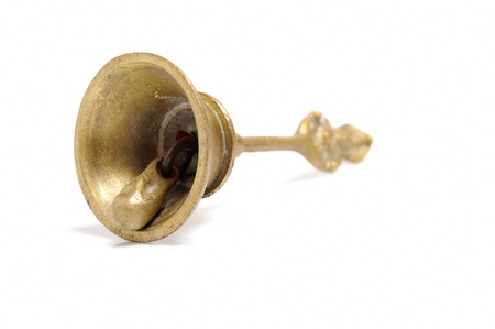 Ancient indian gold bell isolated on whiteの写真素材