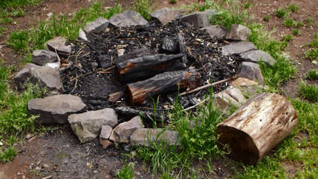 Wooden trunk next to the hearth after the fireのeditorial素材