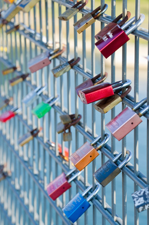 STRASBOURG, FRANCE. 31st August 2016. Sweethearts are beginning to place love padlocks on the Passerelle Mimram, the famous pedestrian bridge linking France and Germany over the Rhine.のeditorial素材
