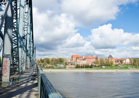 TORUN, POLAND. 6th APRIL 2017. View towards the Old Town of Torun from halfway across JÃ³zef PiÅsudski Bridge. The city of Torun is becoming increasingly popular with tourists after the recent introduction of low-cost flights at nearby airports.のeditorial素材
